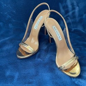 Aquazzura goldtone stilettos. Size 36. Worn once to a gala.